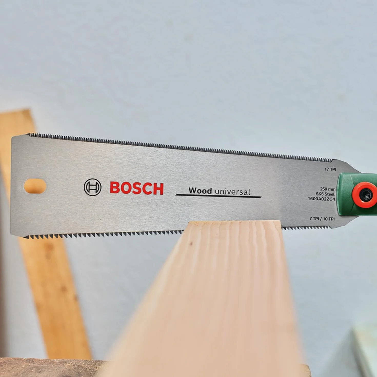 Bosch jap. piła Ryoba 250 mm (piła do cięć blisko powierzchni i precyzyjnych cięć w drewnie oraz tworzywach, brzeszczot ze stali SK5, obustr. zęby 7–10/17 TPI, dł. rękojeść z okładziną Softgrip)