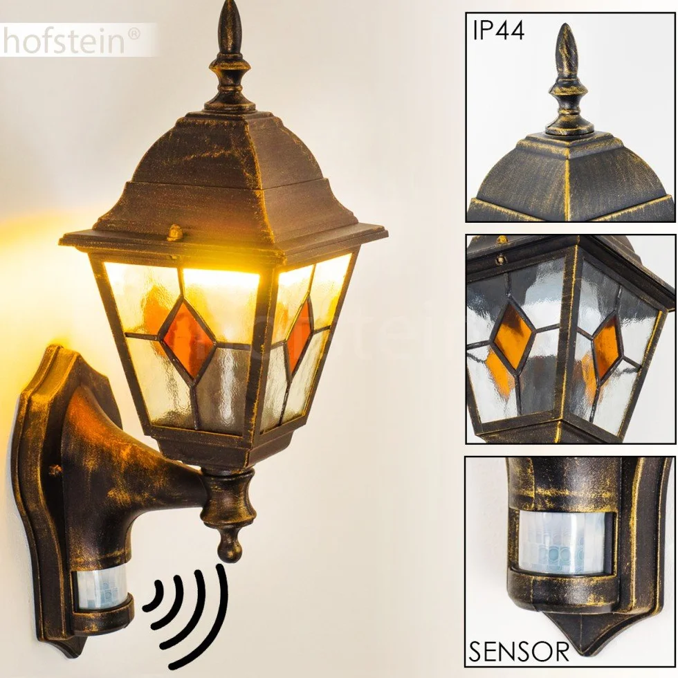 Zewnętrzna lampa ścienna Antibes z czujnikiem ruchu, z odlewu aluminiowego w kolorze brązowym/złotym z przezroczystymi szybami,/podwórko z oprawką E27 w kolorze antycznym, bez żarówek