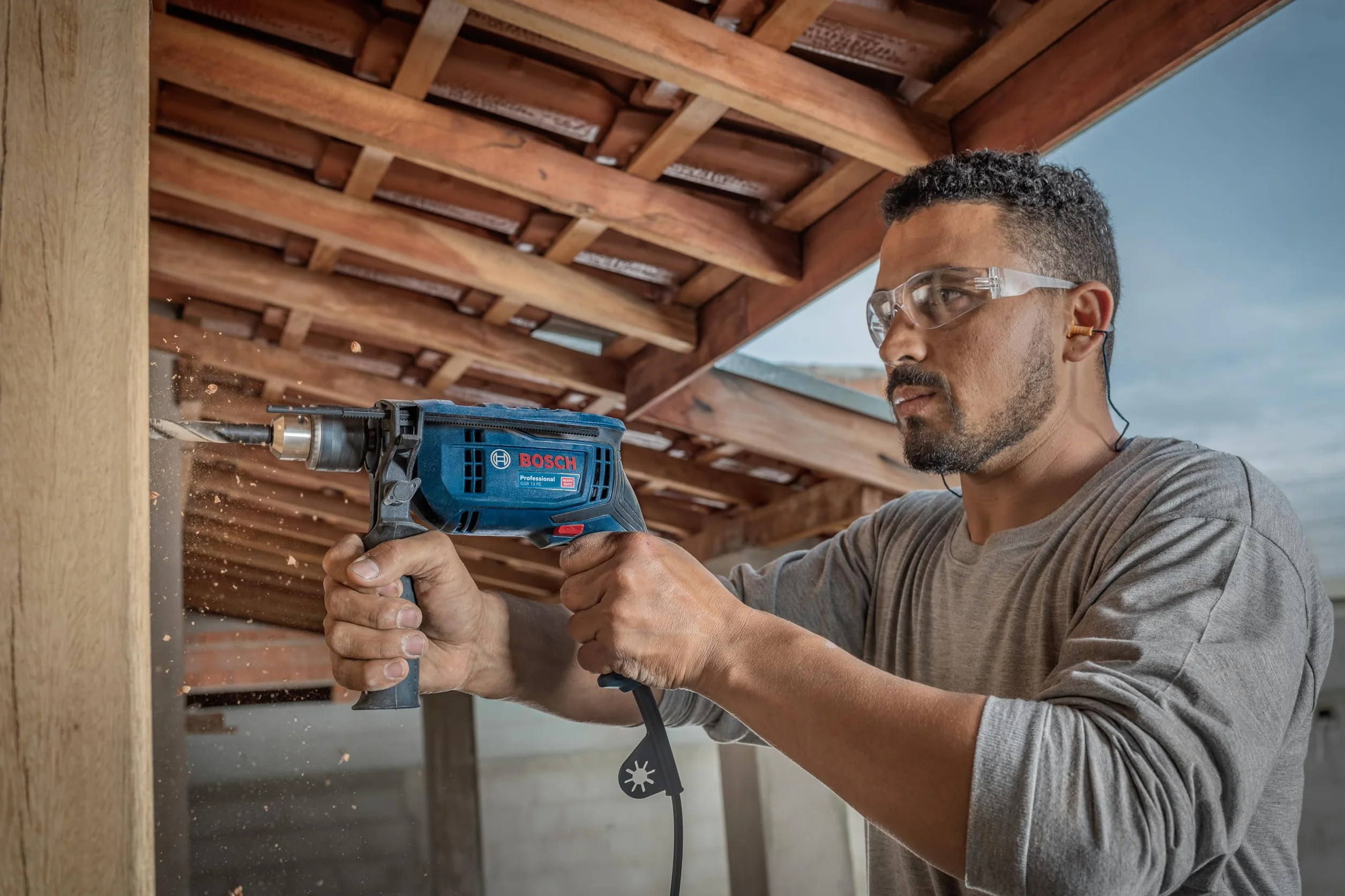 Bosch Professional: wiertarka udarowa GSB 13 RE (600 W, ogranicznik głębokości 210 mm, szybkozaciskowy uchwyt wiertarski 13 mm)