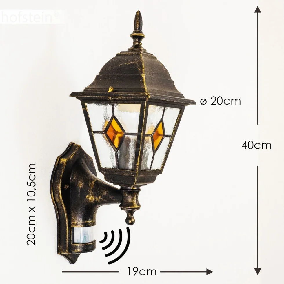 Zewnętrzna lampa ścienna Antibes z czujnikiem ruchu, z odlewu aluminiowego w kolorze brązowym/złotym z przezroczystymi szybami,/podwórko z oprawką E27 w kolorze antycznym, bez żarówek